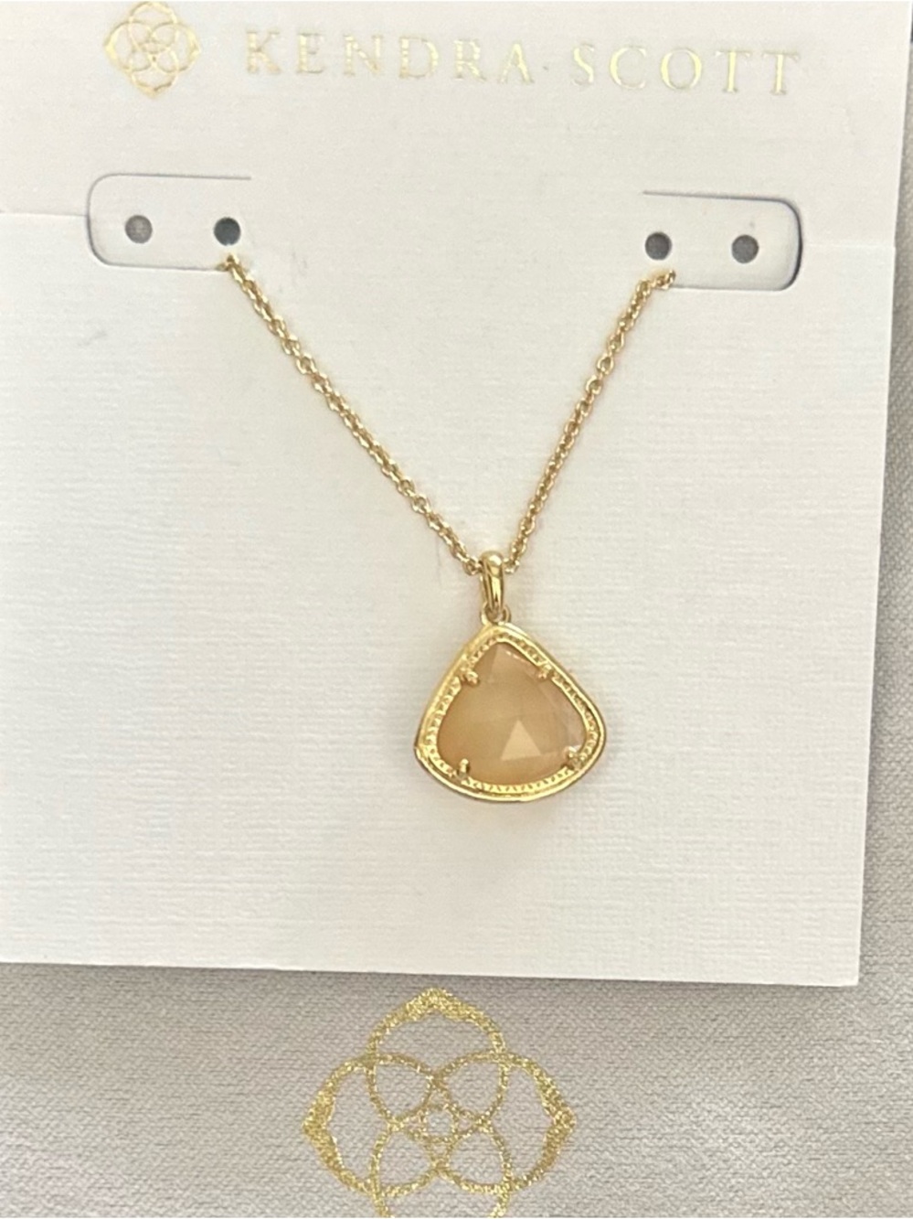 Kendra Scott Gold Necklace with Peach-Tone Faceted Pendant